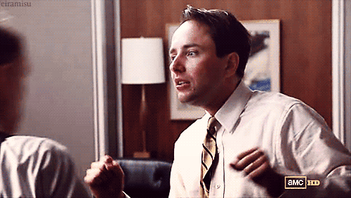 The actor playing Pete Campbell on Mad Men, getting punched in the face by the actor who plays the English guy on Mad Men.  It's a very short clip from Mad Men, is what it is.